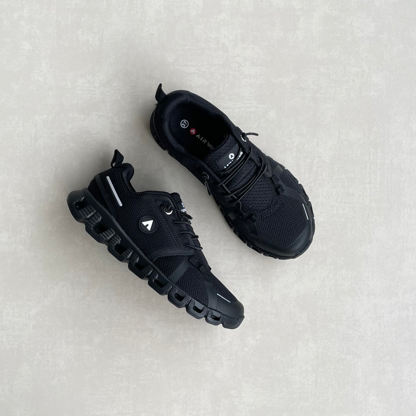 14289 – Tenis Deportivos All Black con Suela Airflow Integrada