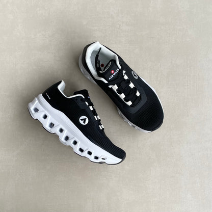 14299 – Tenis Deportivos Negros con Suela Tecnológica y Detalles Blancos