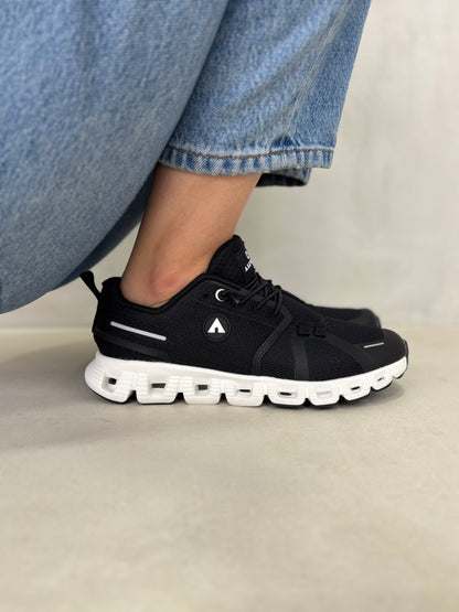 14291 – Tenis Deportivos Negros con Suela Blanca y Tecnología de Amortiguación