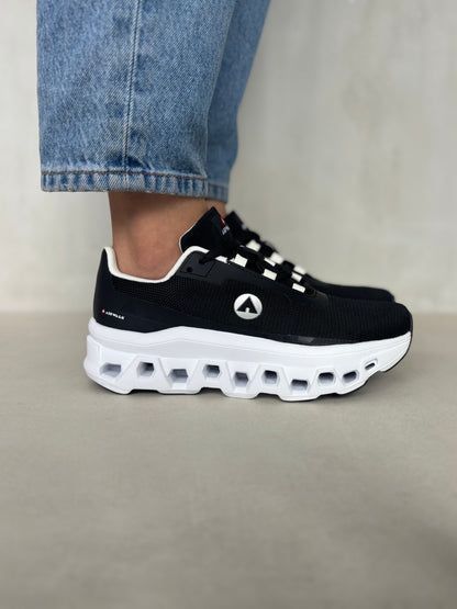 14299 – Tenis Deportivos Negros con Suela Tecnológica y Detalles Blancos