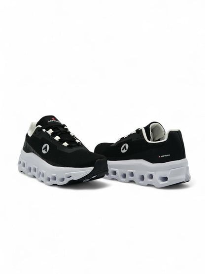 14299 – Tenis Deportivos Negros con Suela Tecnológica y Detalles Blancos