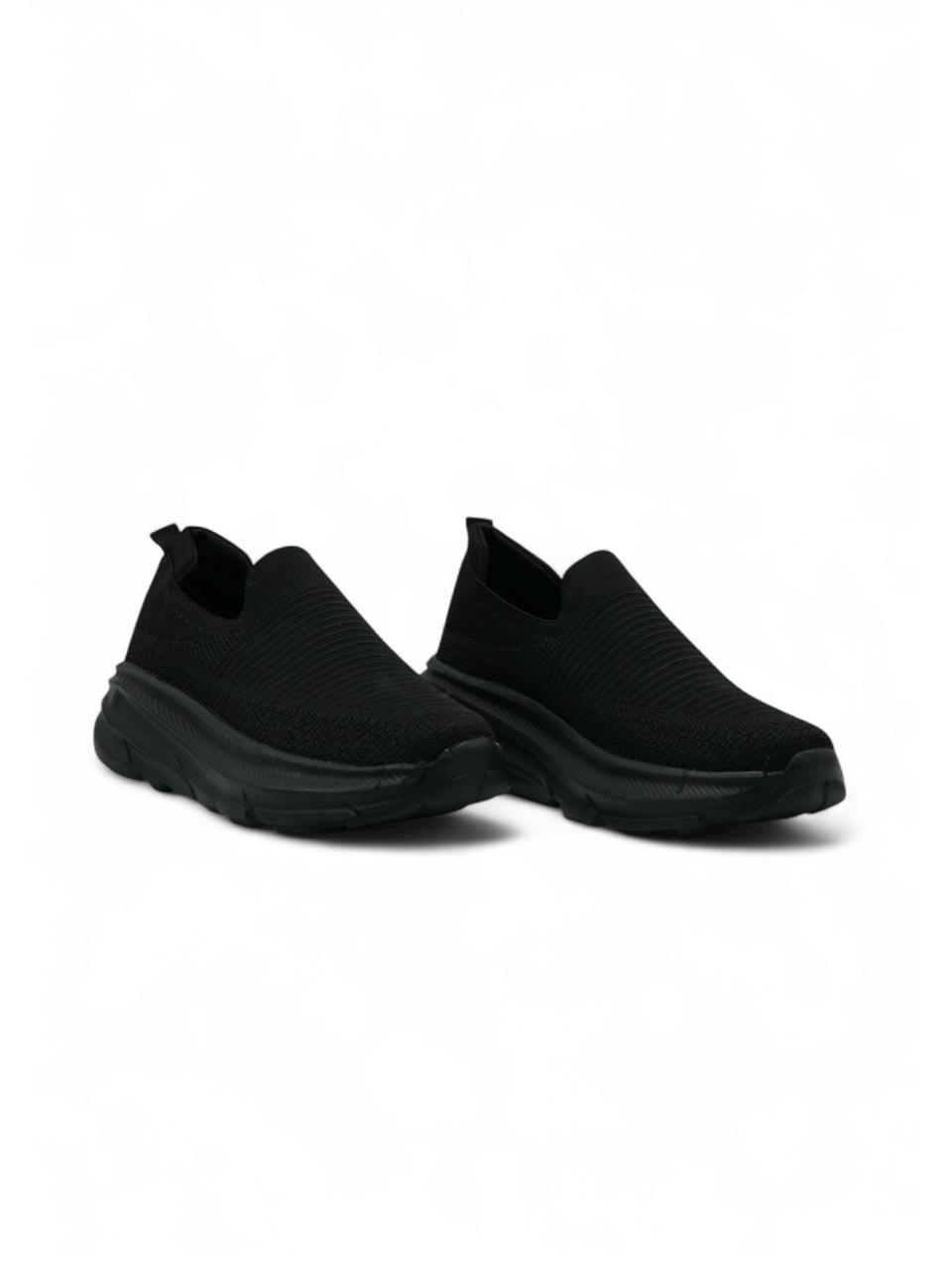 14284 – Zapatos Slip-On Negros con Suela Alta y Tejido Elástico